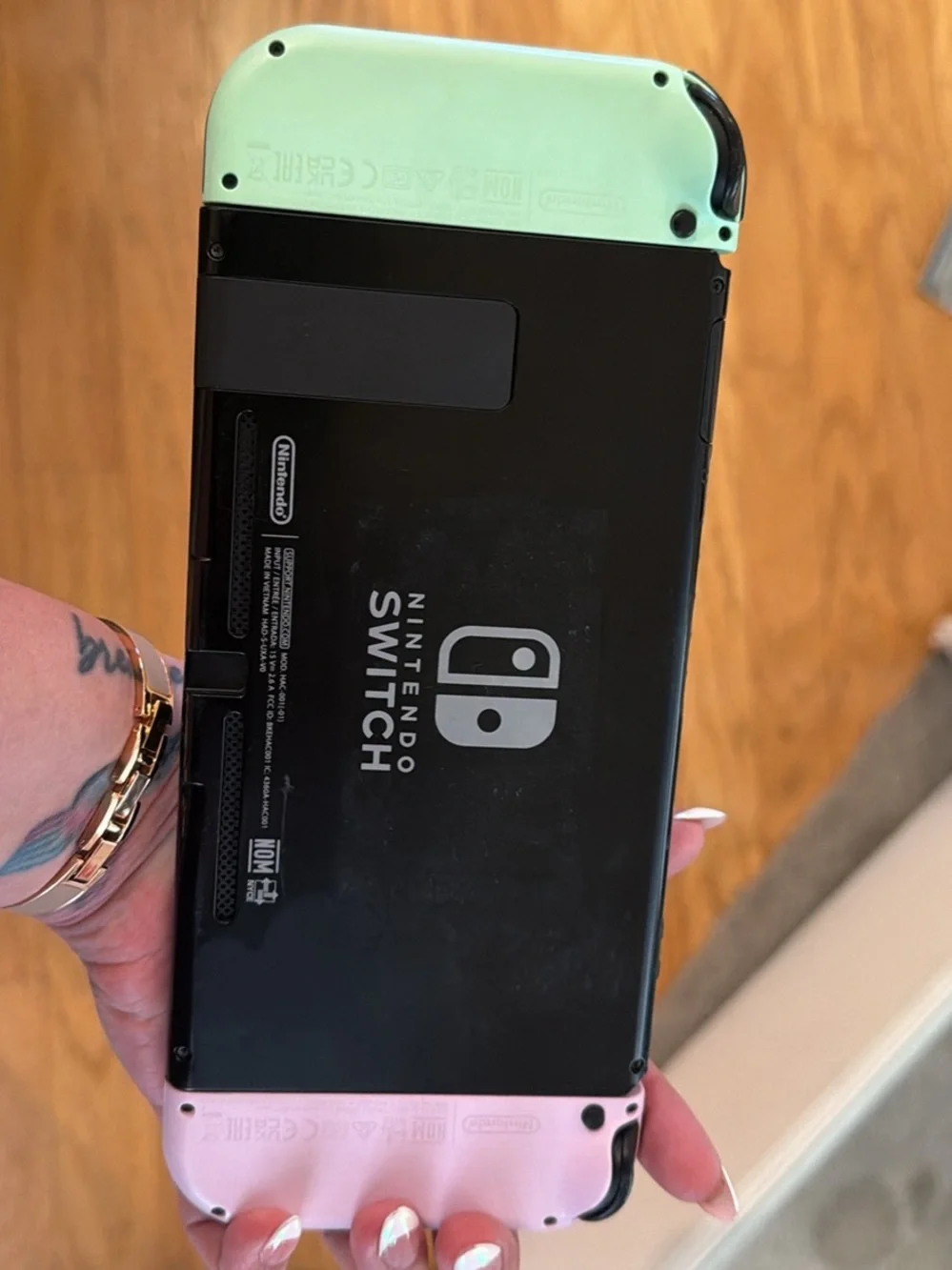 Nintendo Switch Console with Purple & Mint Joy-Con Controllers